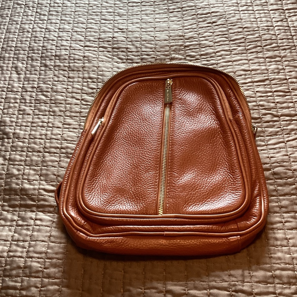 Valentina pebble leather sling back pack orange brown in color